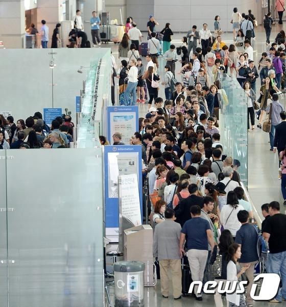 中秋小長假 韓國返鄉團圓潮海外旅行潮并現（組圖）