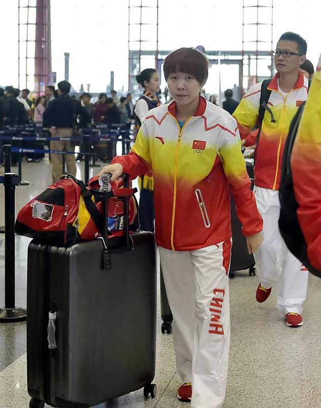 劉國梁率領中國乒乓隊踏上仁川亞運征程(組圖）