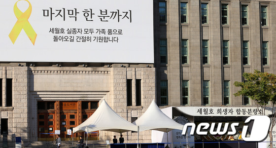 韓“世越號”失蹤者家屬拒絕打撈沉船 堅持水中搜索（組圖）