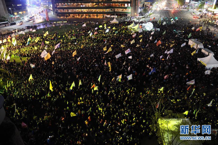 韓國民眾舉行集會紀念“歲月”號海難一周年（組圖）