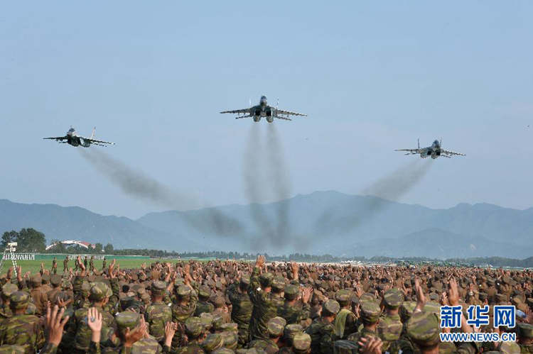 金正恩指導人民軍戰斗飛行技術大會【組圖】