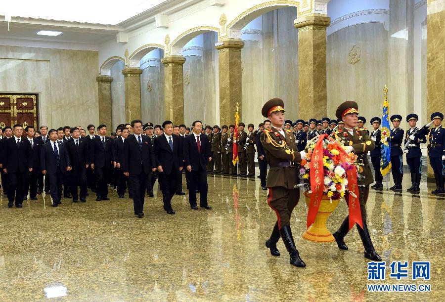 劉云山出席朝鮮勞動黨成立70周年慶?；顒?
并赴安州祭掃中國人民志愿軍烈士陵園