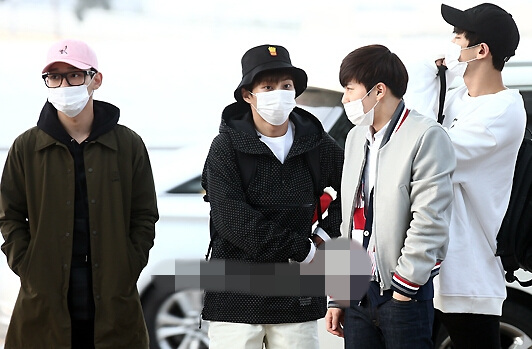 EXO赴沈陽參加公演 口罩遮面現身機場【組圖】