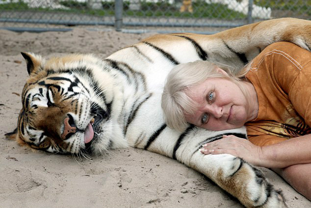 不同尋常的人與動物友情：細數全球“瘋狂動物城”（組圖）