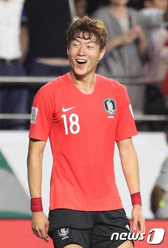 黃義助綻放勝利笑容。