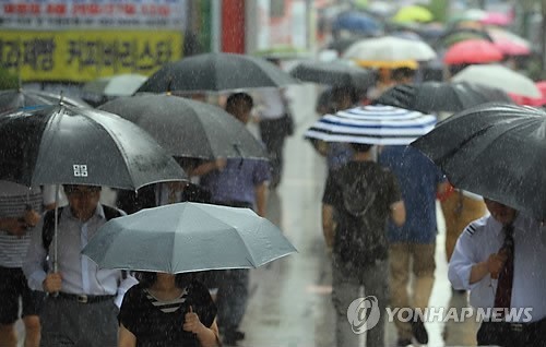 暴雨席卷韓國  酷暑中旬來臨圖片來源：韓聯社